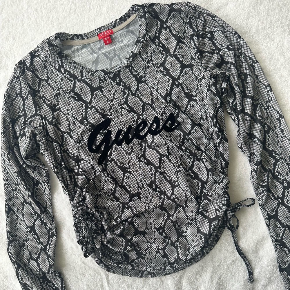 Guess top, black and white, cute for going out. Size M